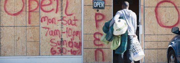 Ferguson Business Boarded Up – Nat Guard Armored Vehicles Staged